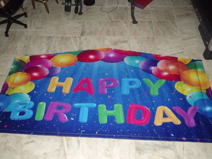 Blue Happy Birthday bounce house theme banner